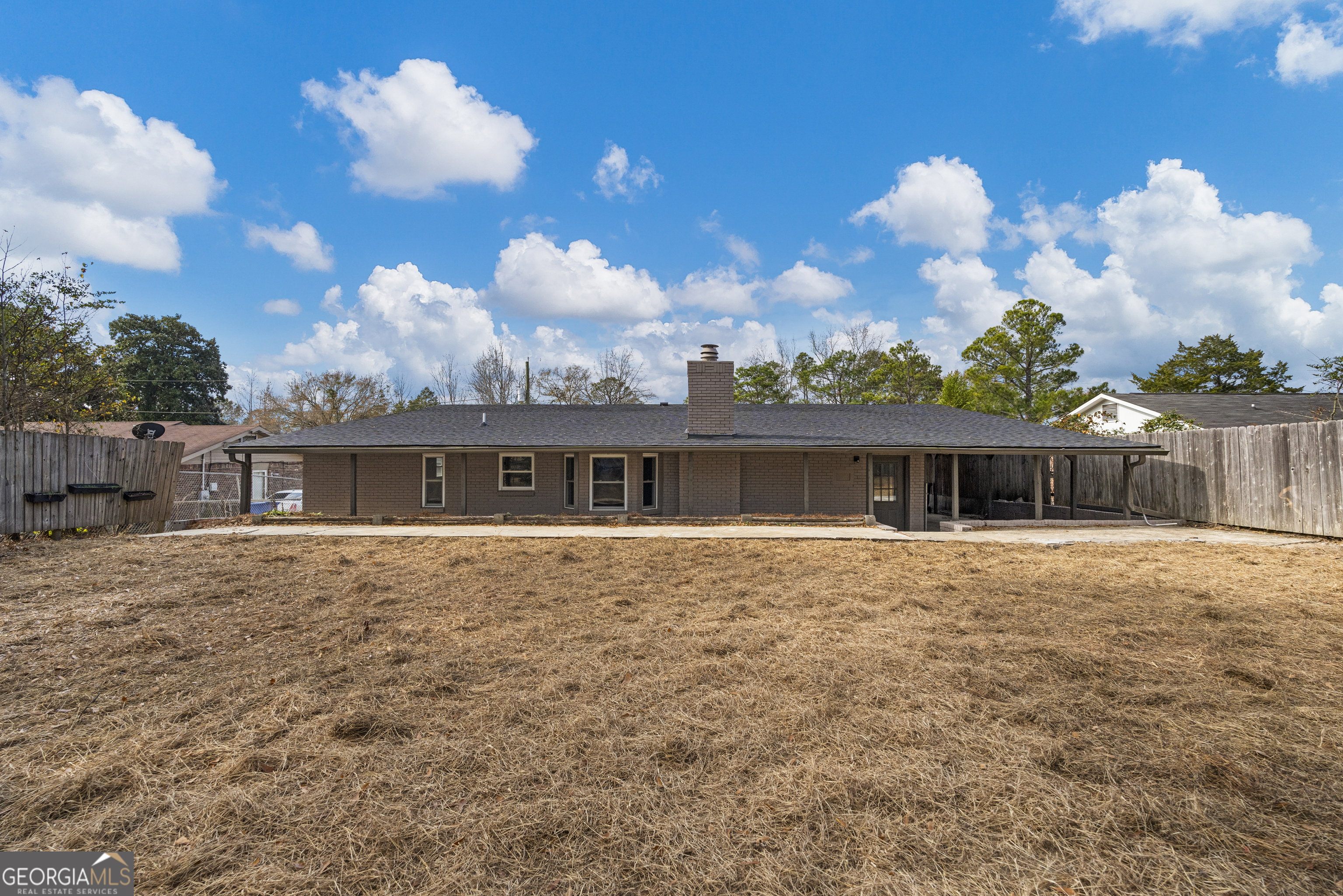 2312 Burnside Drive Columbus, GA 31907 - Photo 29 of 29 a view of a house with a backyard