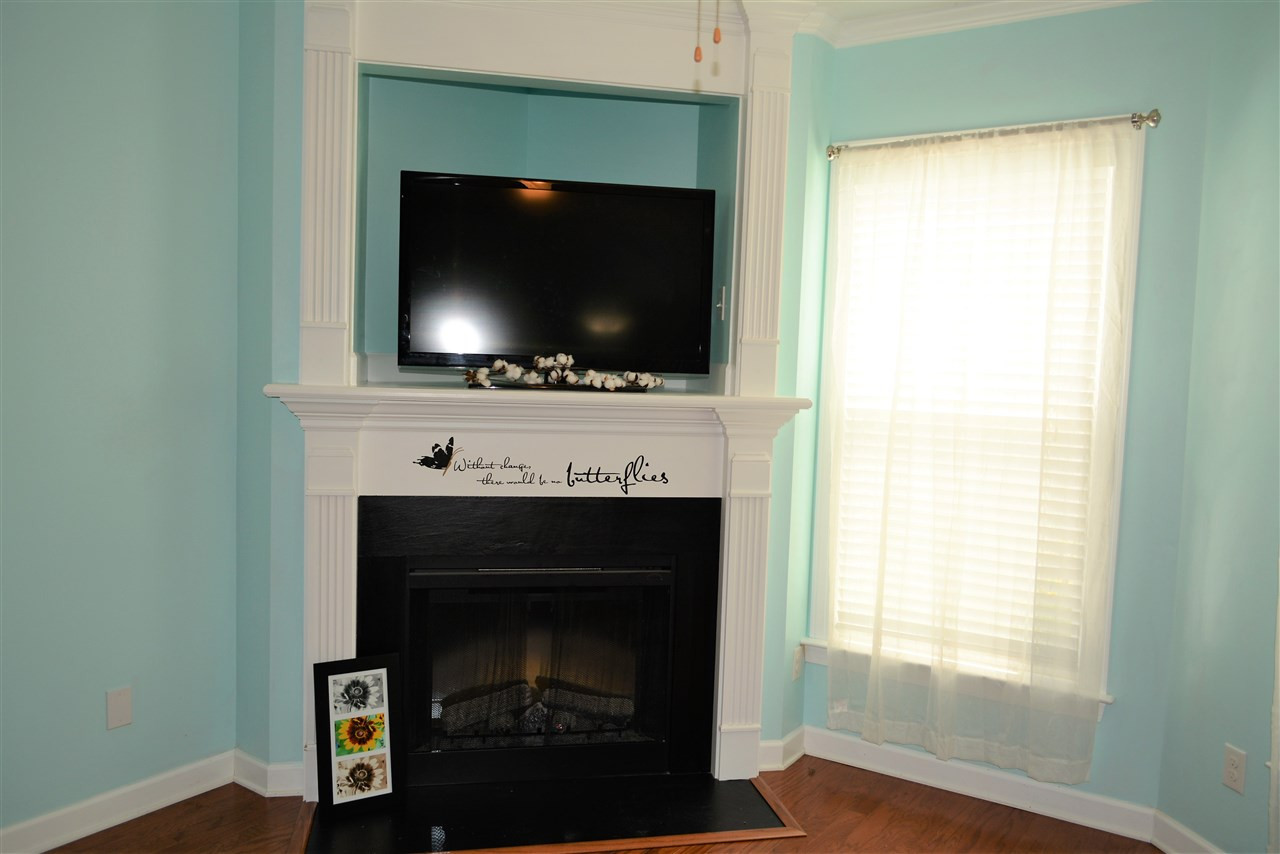 2003 Chancellor Place Raleigh, NC 27603 - Photo 4 of 30 Cozy fireplace and large TV space