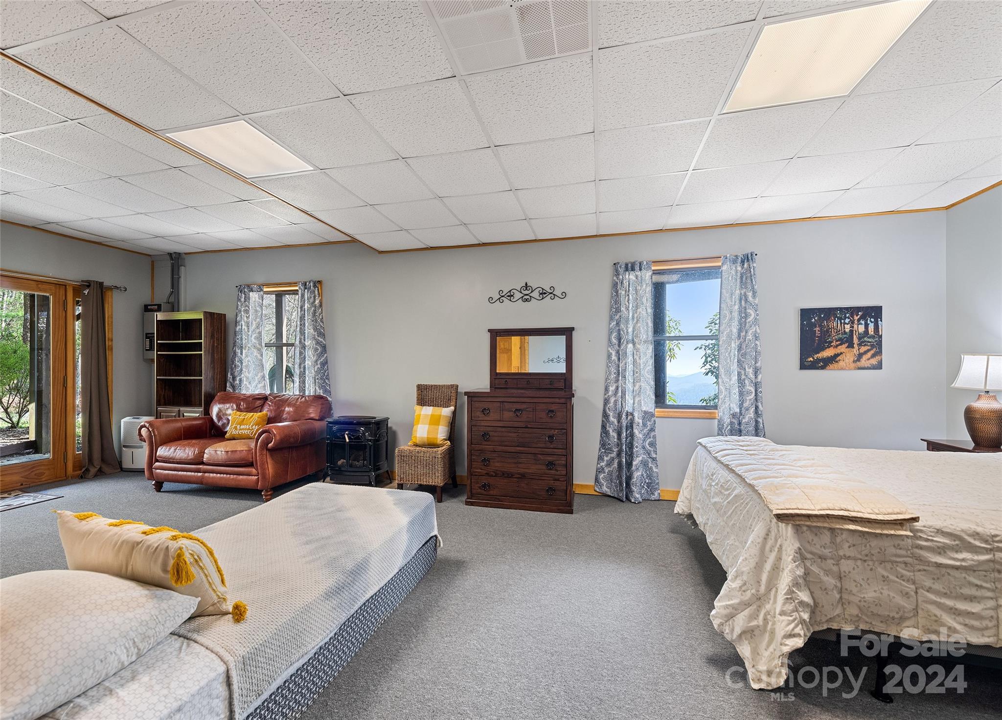 2521 Pless Underwood Road Maggie Valley, NC 28751 - Photo 29 of 46 a bedroom with bed and window