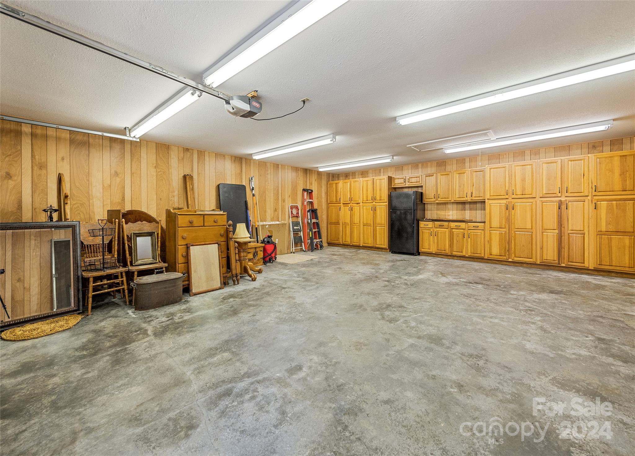 2521 Pless Underwood Road Maggie Valley, NC 28751 - Photo 32 of 46 a view of a room with gym equipment and windows