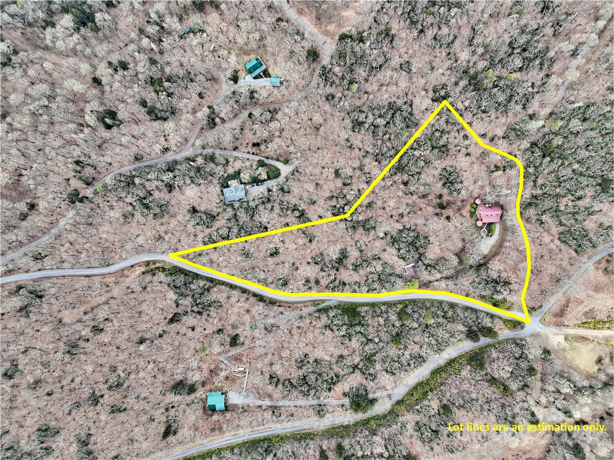 2521 Pless Underwood Road Maggie Valley, NC 28751 - Photo 35 of 46 a view of a dry yard with wooden fence