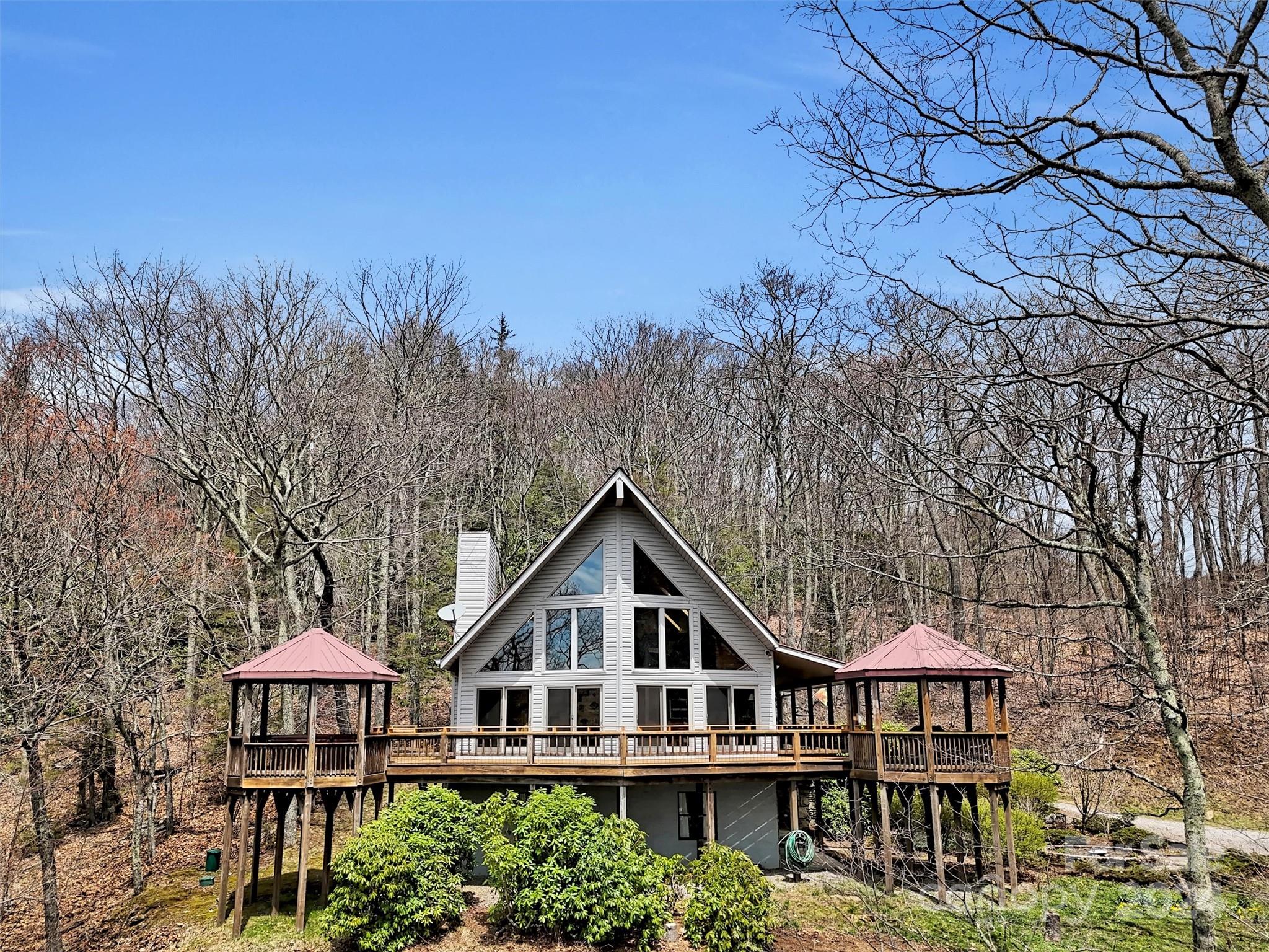 2521 Pless Underwood Road Maggie Valley, NC 28751 - Photo 38 of 46 a front view of a house with a yard