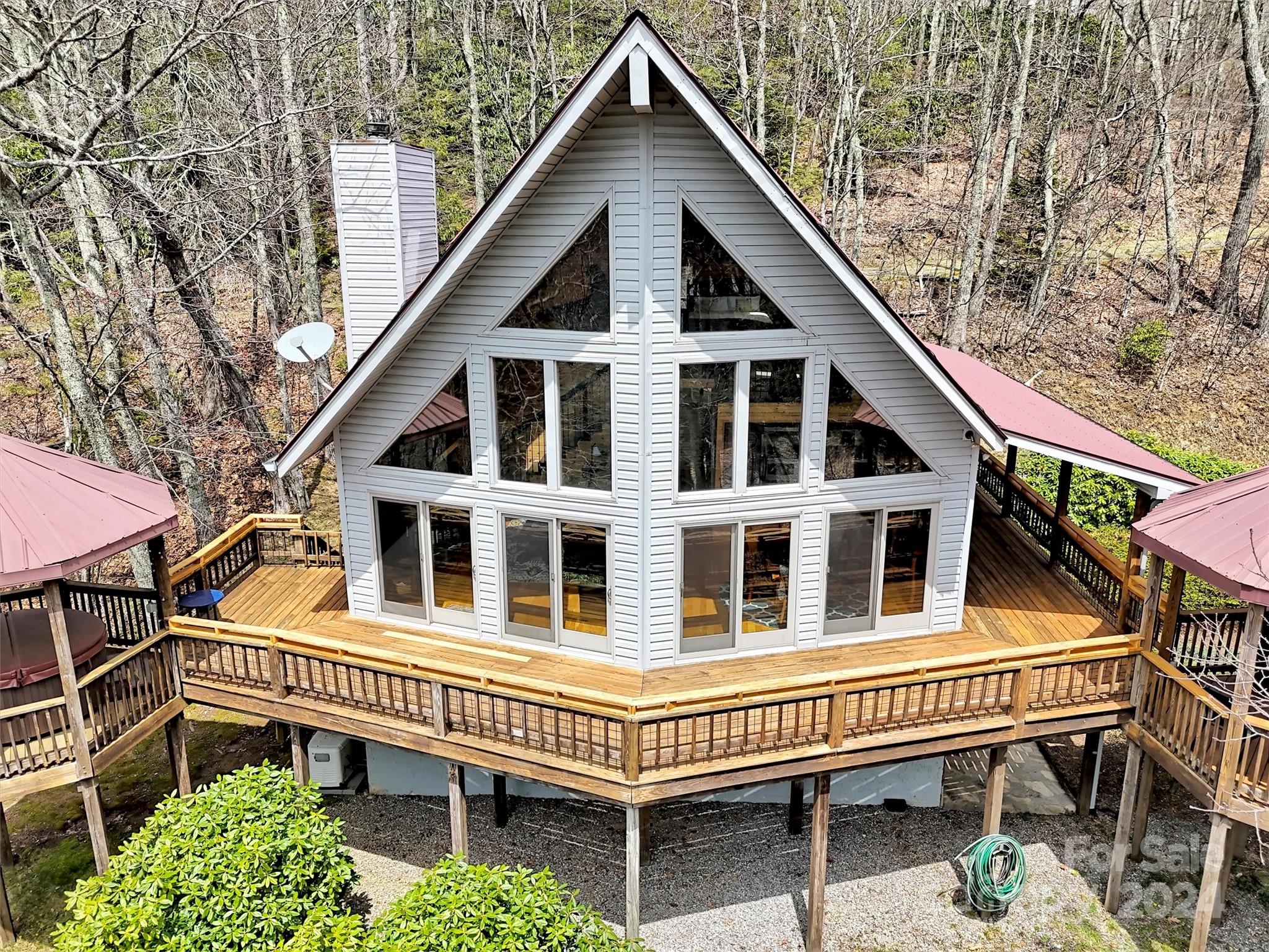 2521 Pless Underwood Road Maggie Valley, NC 28751 - Photo 42 of 46 a front view of a house with a yard