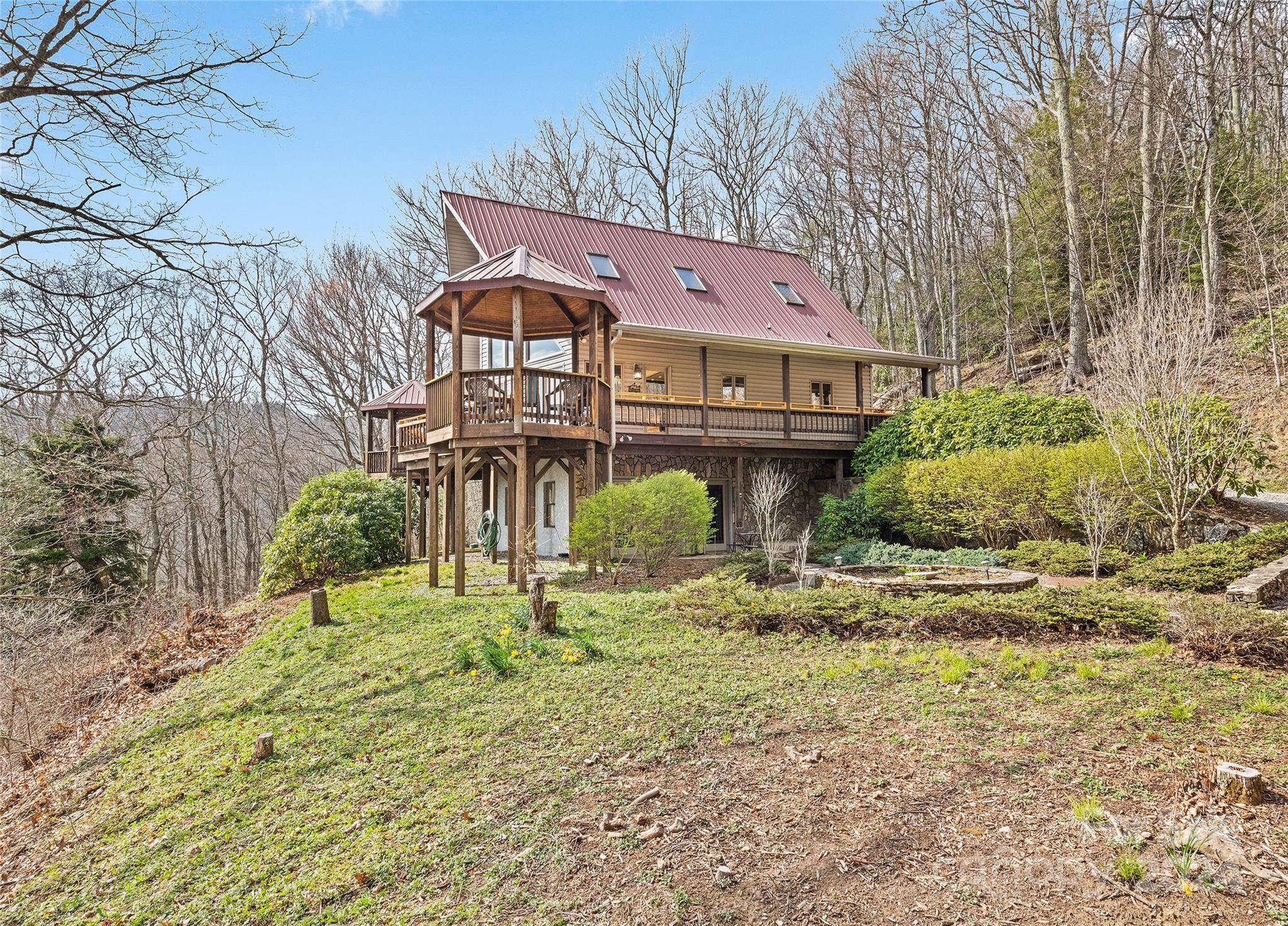 2521 Pless Underwood Road Maggie Valley, NC 28751 - Photo 46 of 46 a front view of a house with a yard
