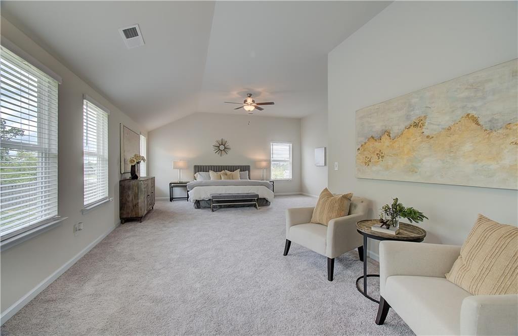 467 Collier Mls Road Lawrenceville, GA 30045 - Photo 34 of 39 a living room with furniture and a chandelier