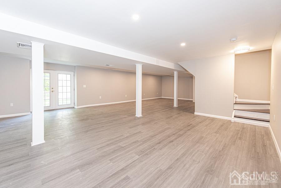 791 Wright Debow Road Jackson, NJ 08527 - Photo 24 of 31 a view of an empty room with wooden floor and a window
