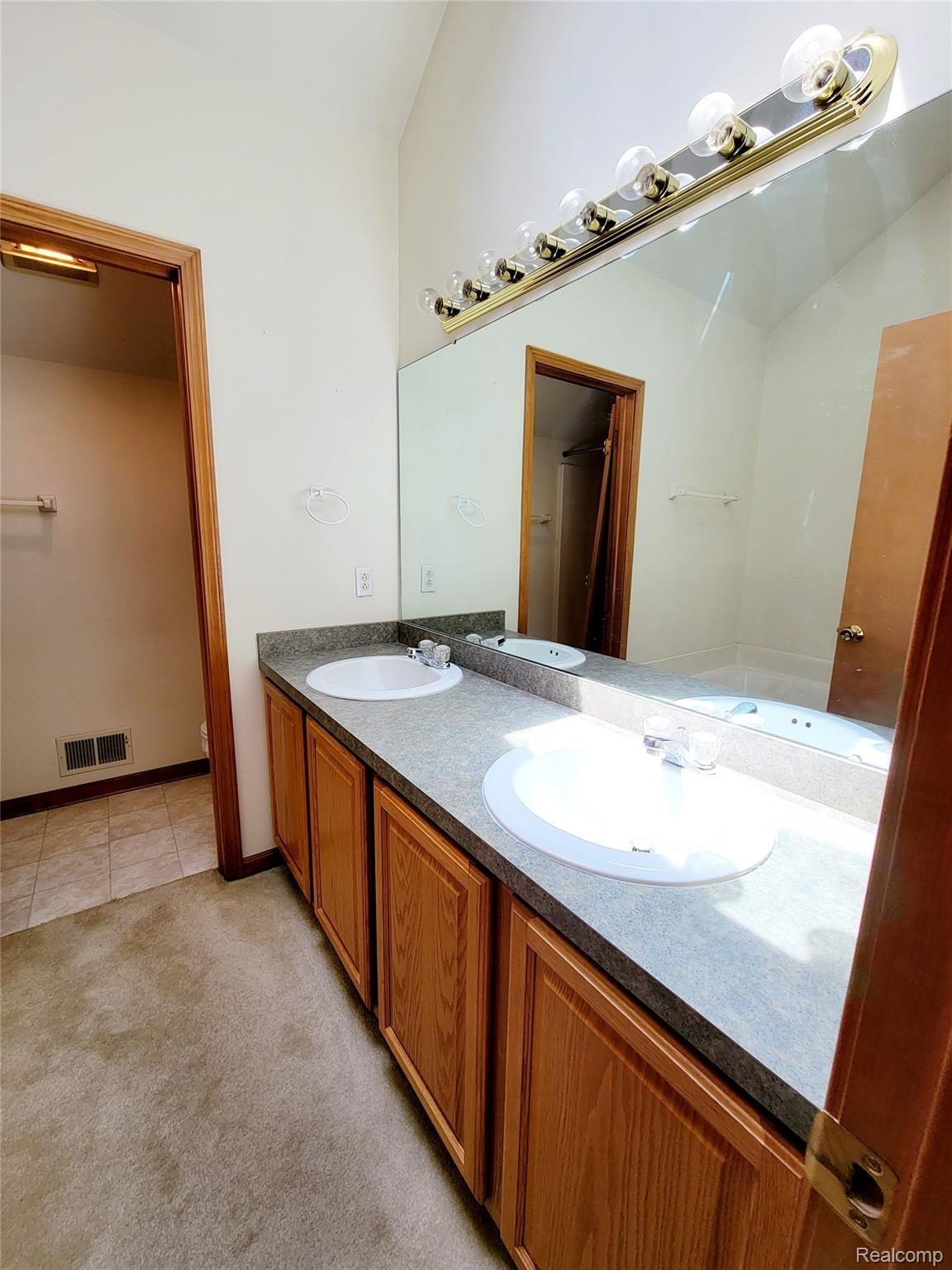 6768 Lockmill Road Temperance, MI 48182 - Photo 25 of 34 Owner full bath with double vanity