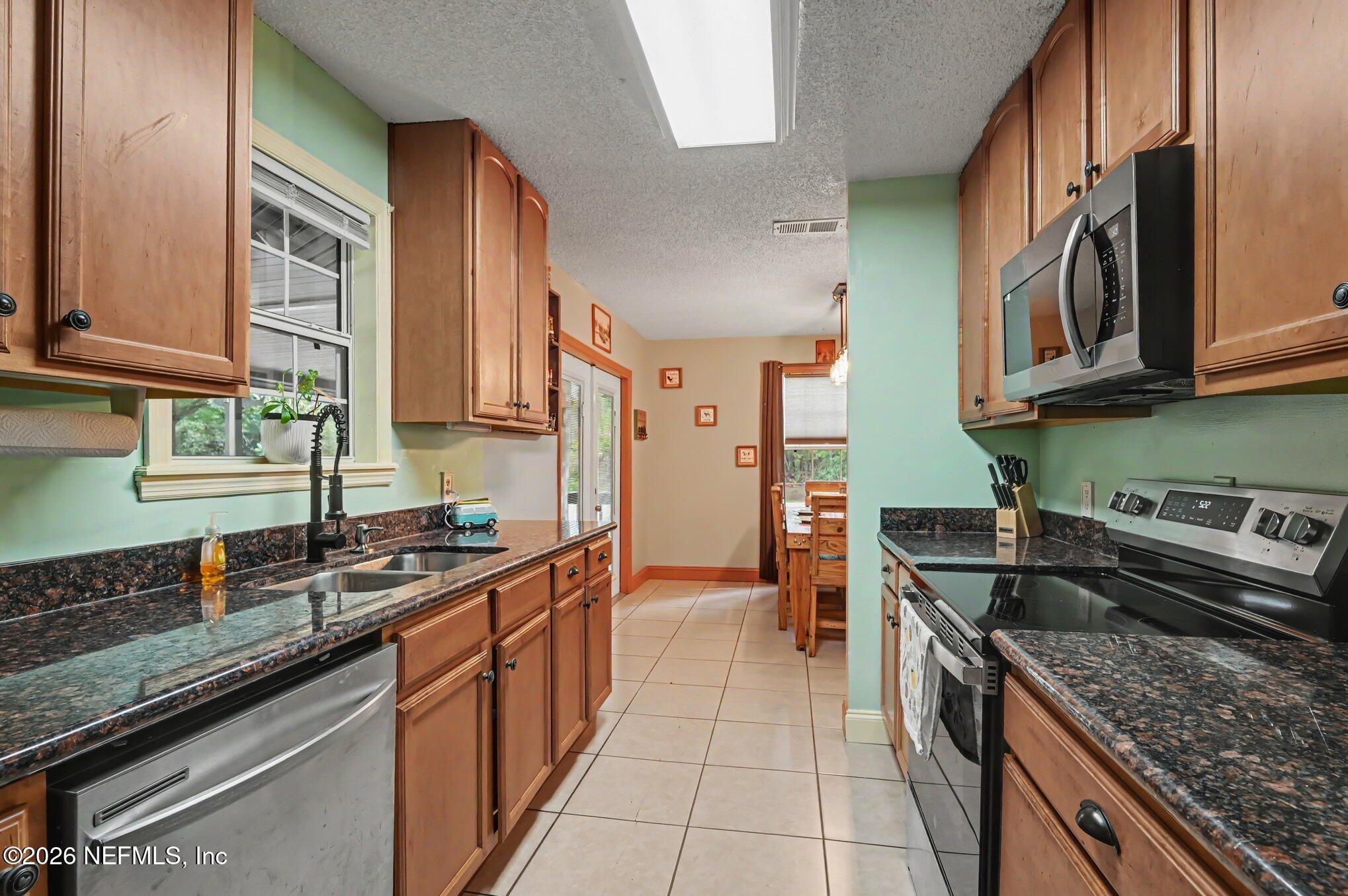 490 Pine Woods Road Ormond Beach, FL 32174 - Photo 8 of 29 009_file_6471