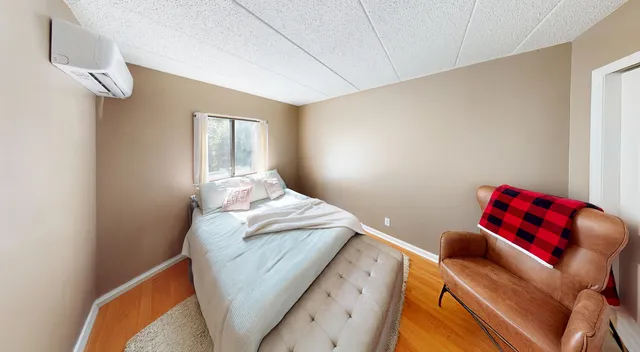 a living room with furniture and a gate