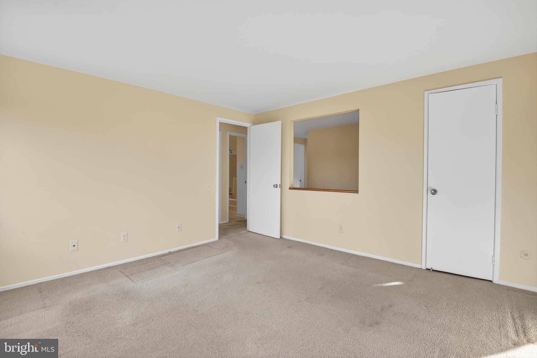 19144 Roman Way Gaithersburg, MD 20886 - Photo 18 of 31 a view of an empty room and a window