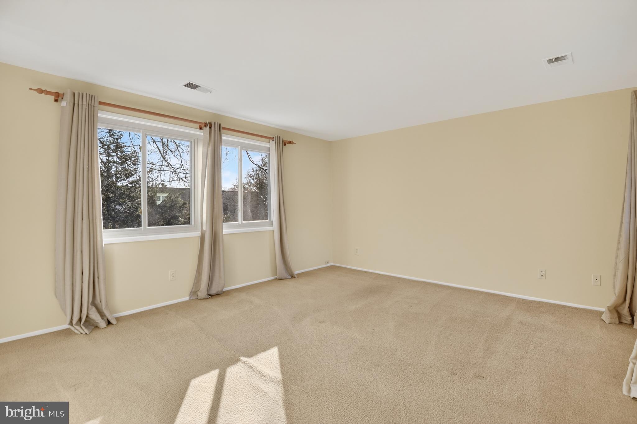 19144 Roman Way Gaithersburg, MD 20886 - Photo 22 of 31 a view of an empty room with a window