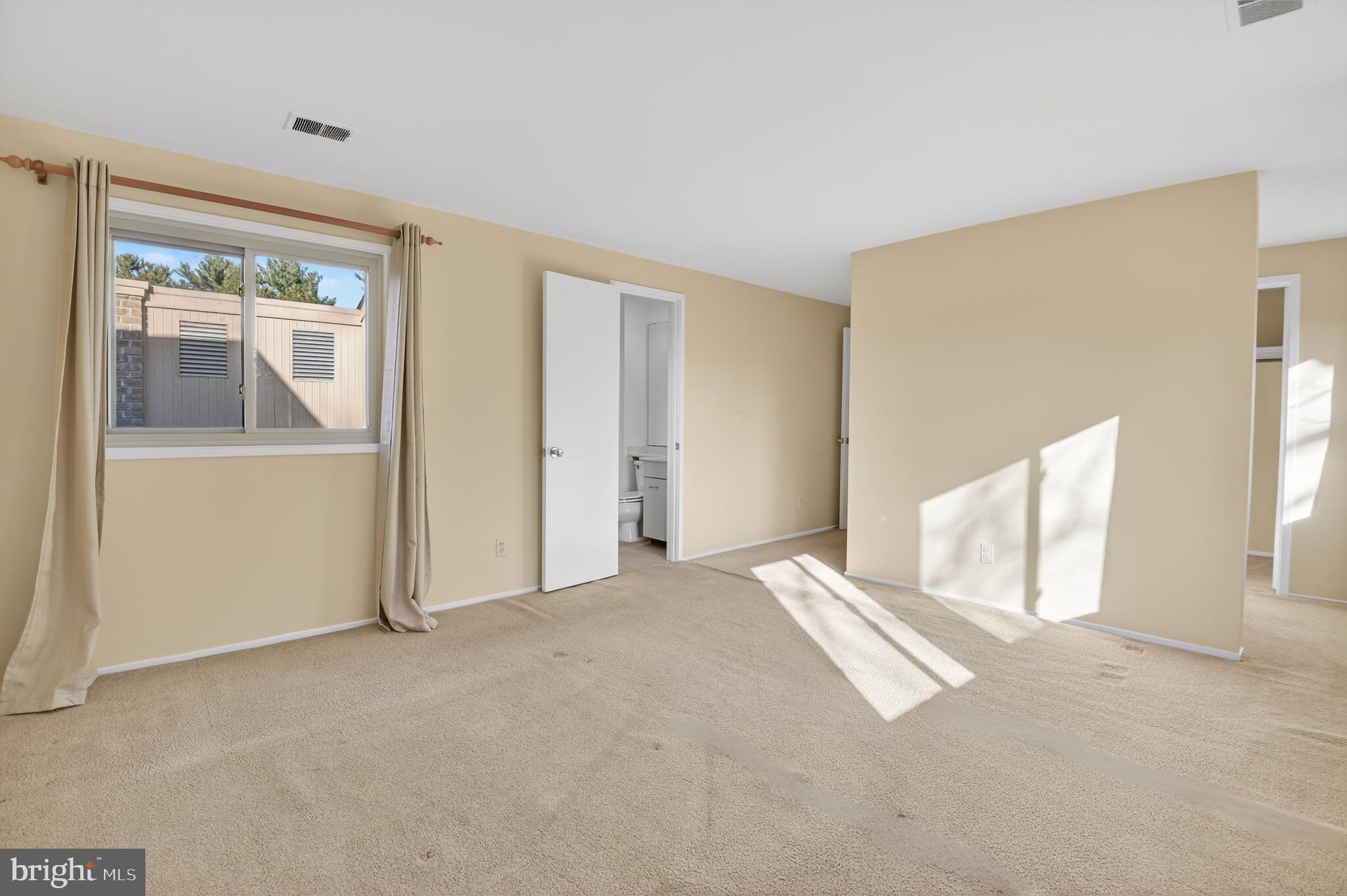 19144 Roman Way Gaithersburg, MD 20886 - Photo 23 of 31 a view of empty room with windows