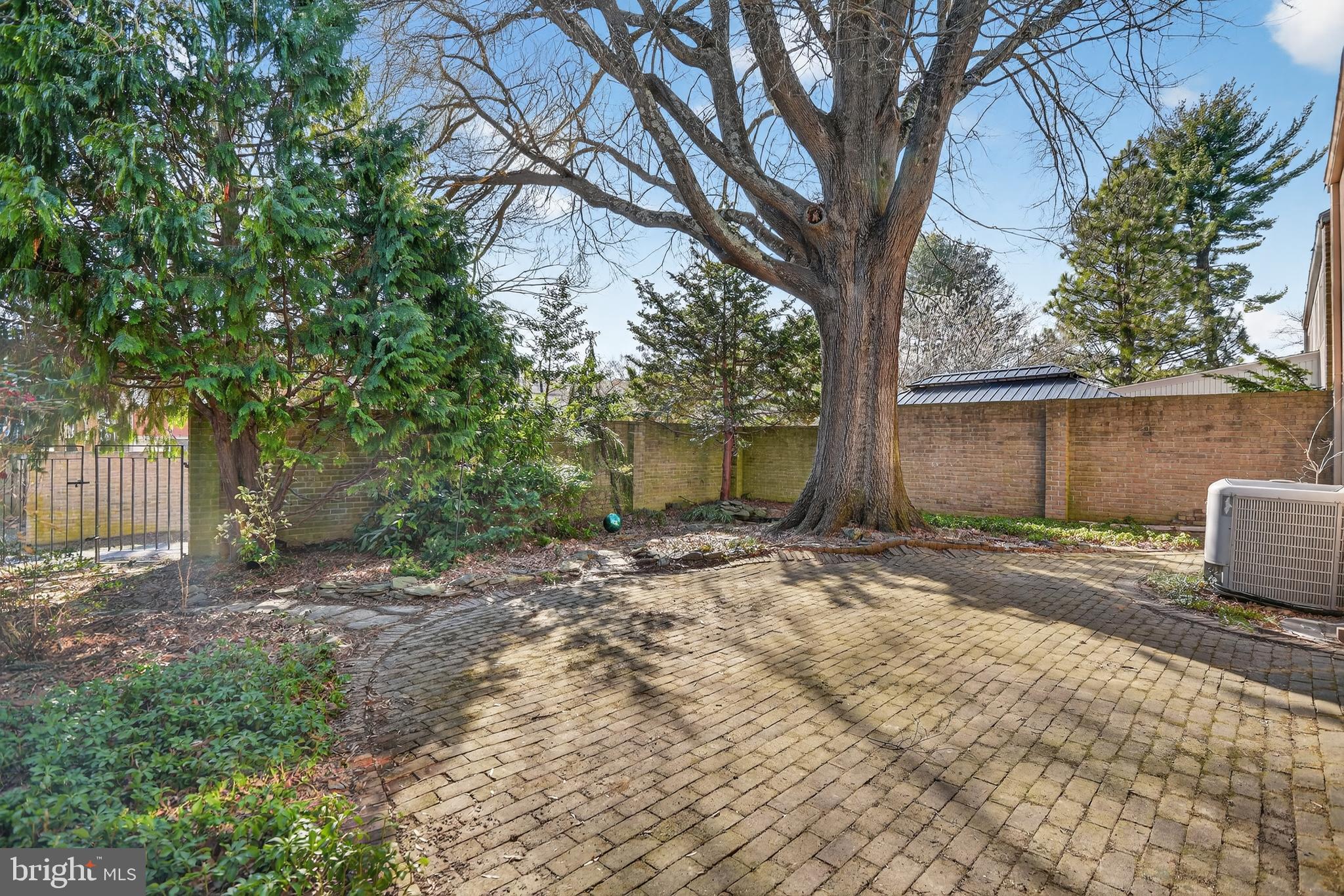19144 Roman Way Gaithersburg, MD 20886 - Photo 31 of 31 a view of a house with a tree in the background