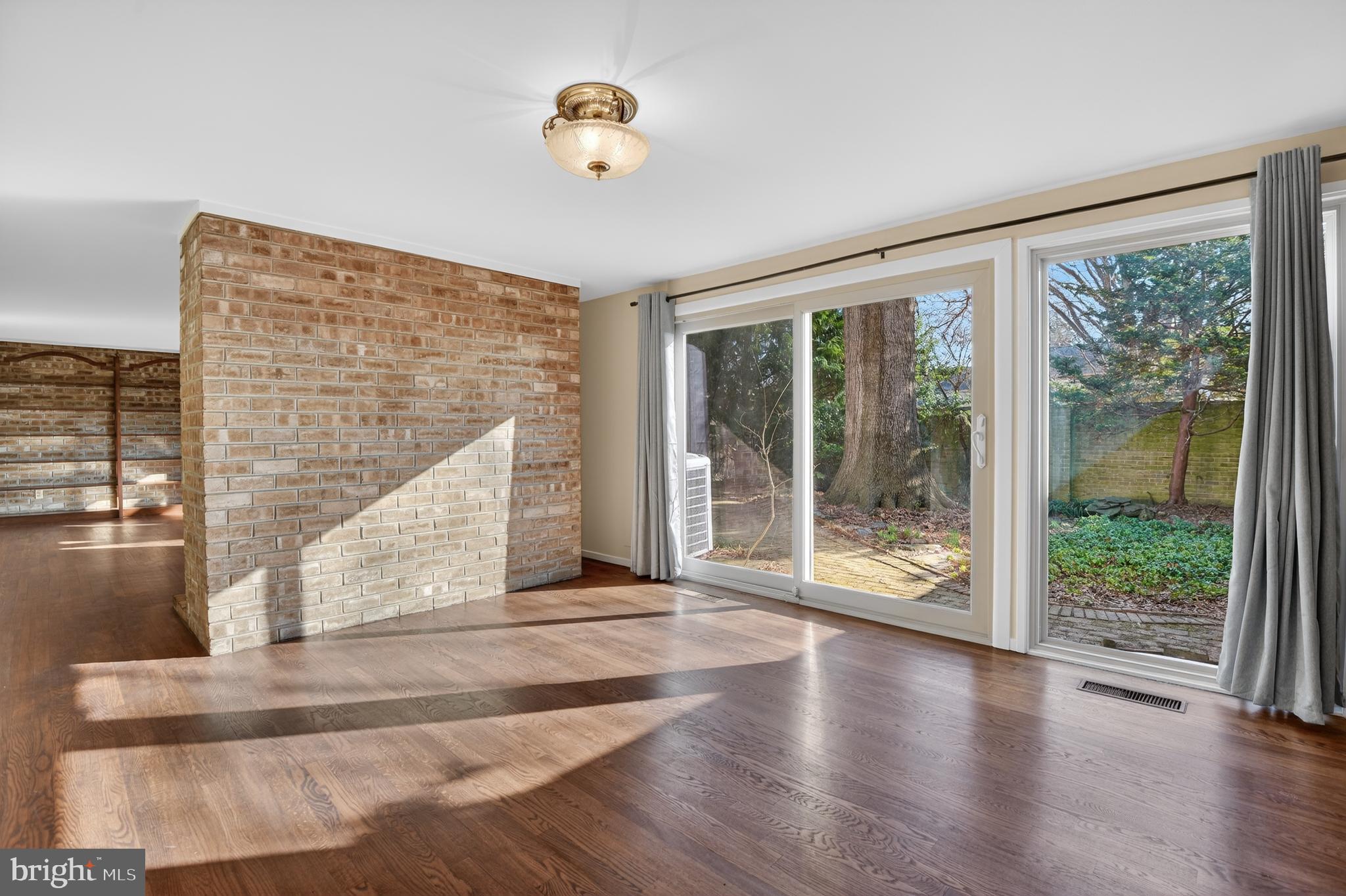 19144 Roman Way Gaithersburg, MD 20886 - Photo 9 of 31 a view of an entryway with wooden floor