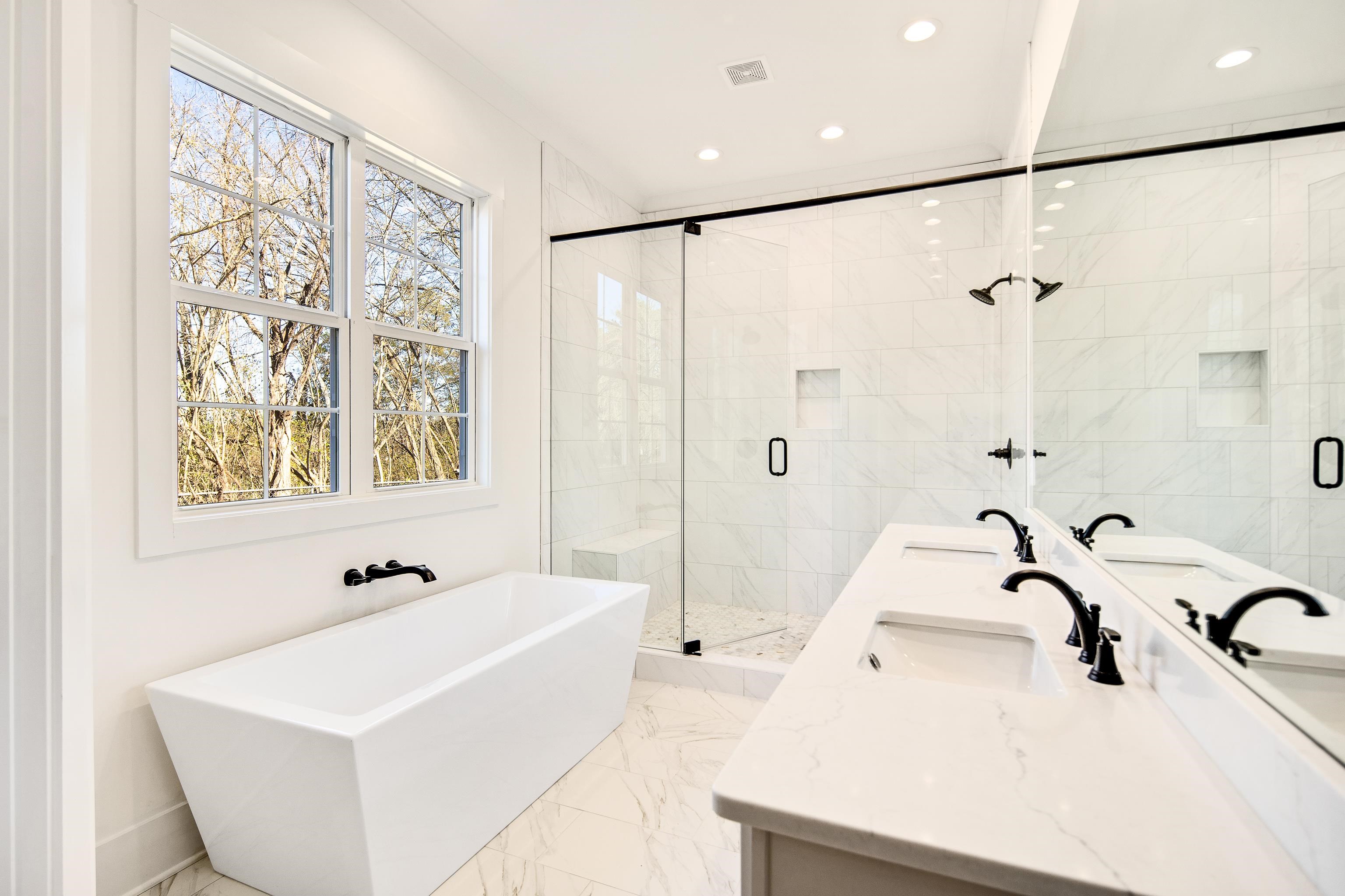 641 Fletcher Road Collierville, TN 38017 - Photo 15 of 39 a bathroom with a sink and a bathtub