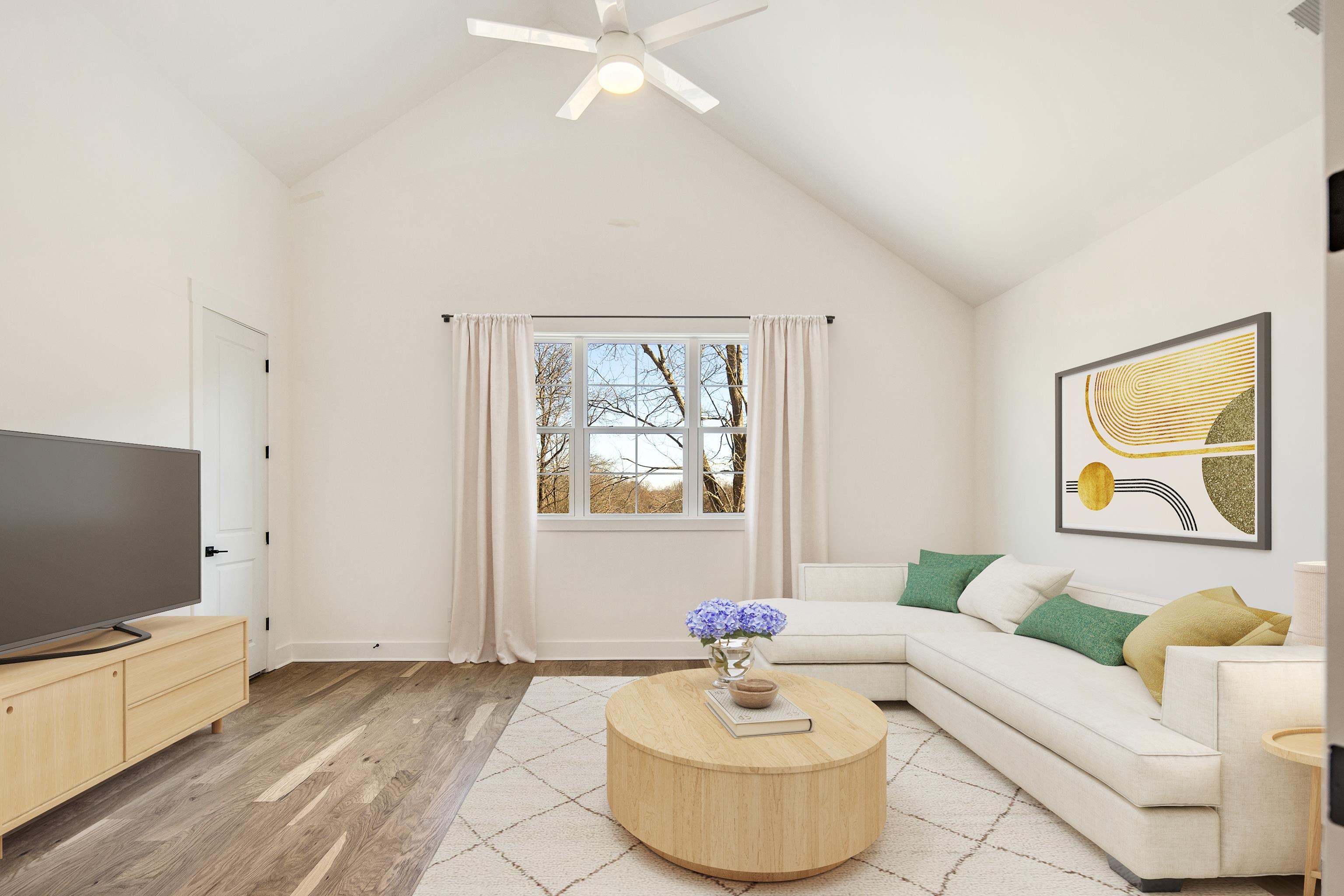 641 Fletcher Road Collierville, TN 38017 - Photo 30 of 39 a living room with furniture and a flat screen tv