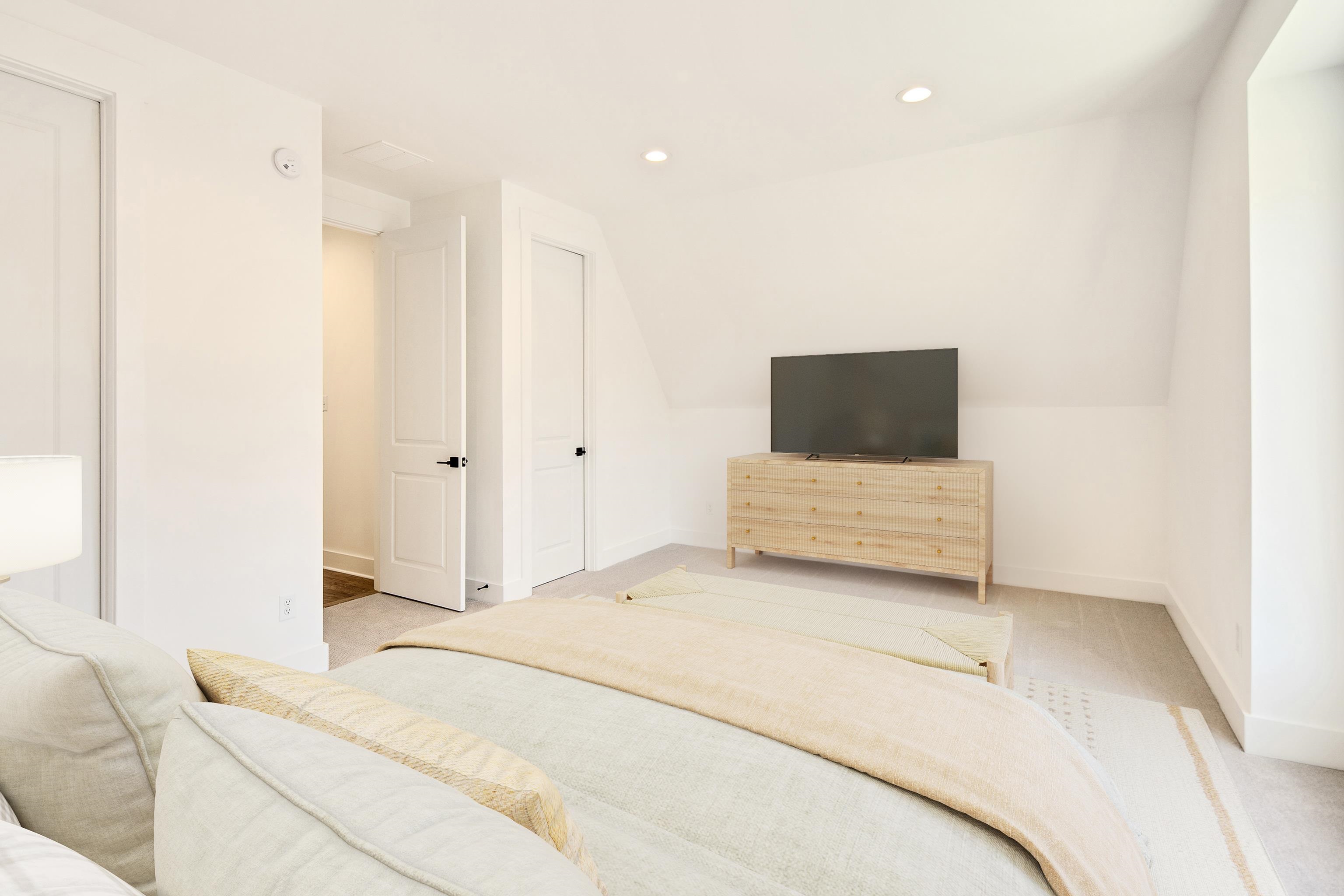 641 Fletcher Road Collierville, TN 38017 - Photo 34 of 39 a bedroom with a bed and a flat screen tv