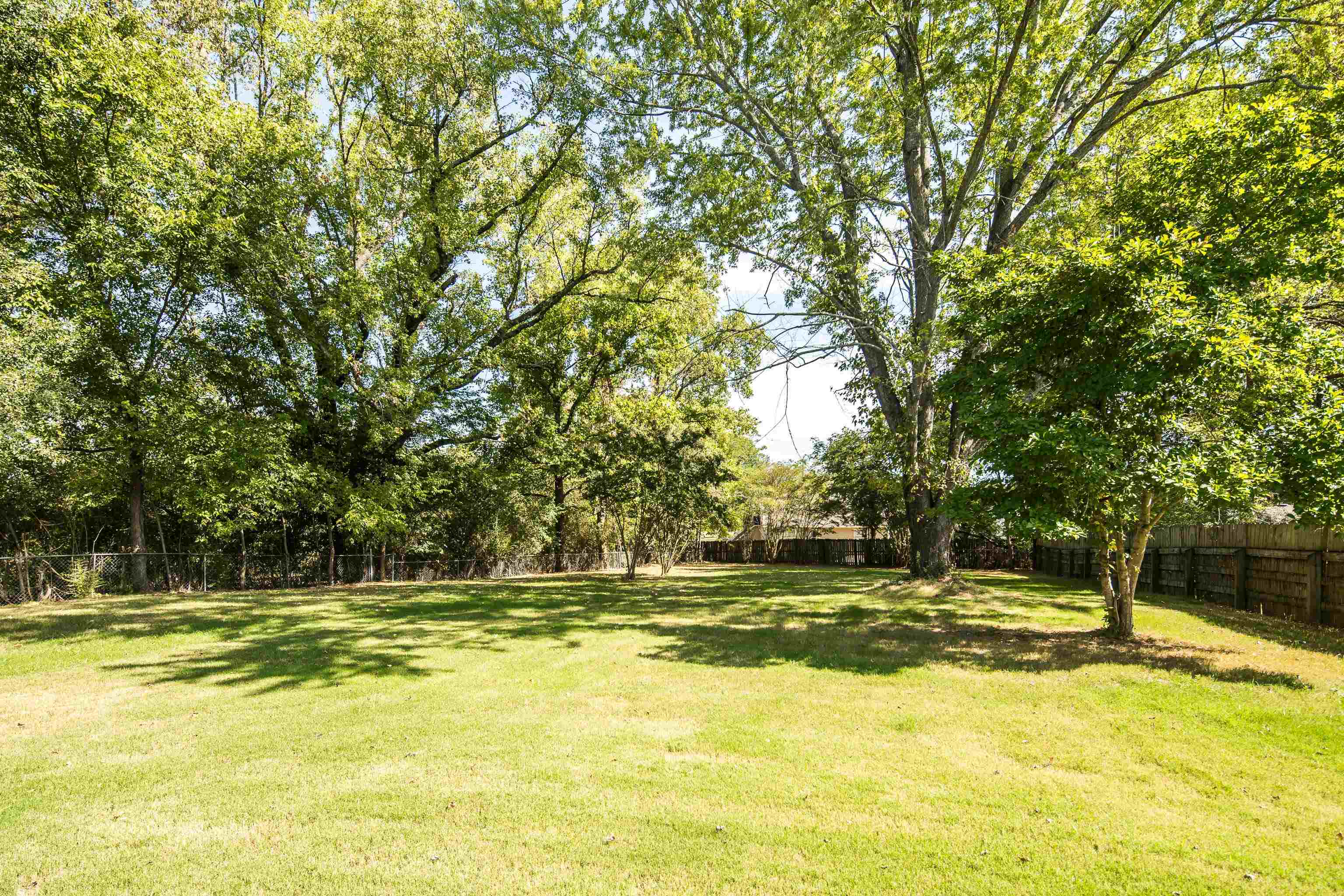 641 Fletcher Road Collierville, TN 38017 - Photo 38 of 39 a view of a swimming pool with an outdoor space and seating area