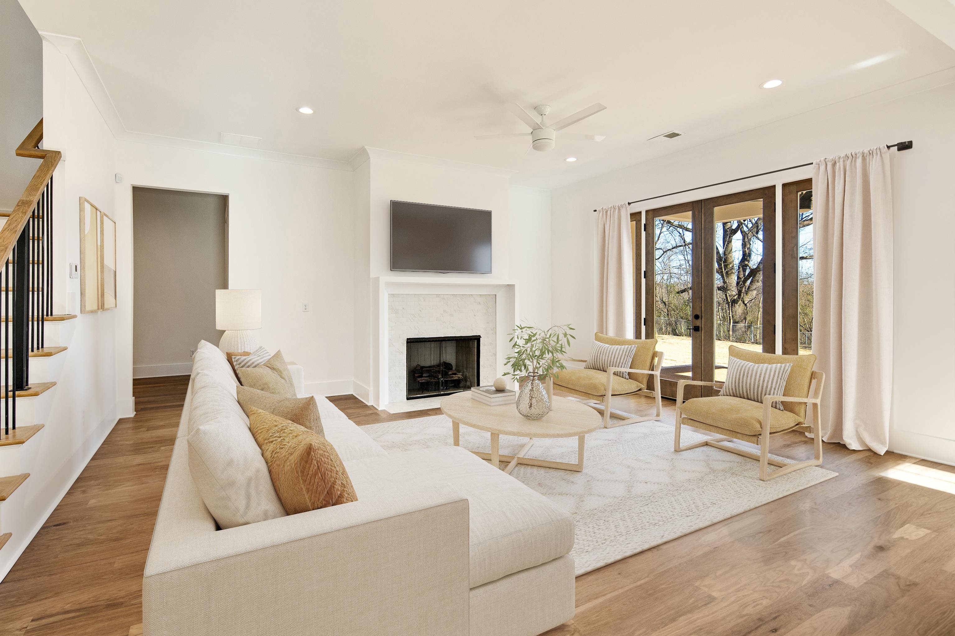 641 Fletcher Road Collierville, TN 38017 - Photo 8 of 39 a living room with furniture fireplace and a flat screen tv