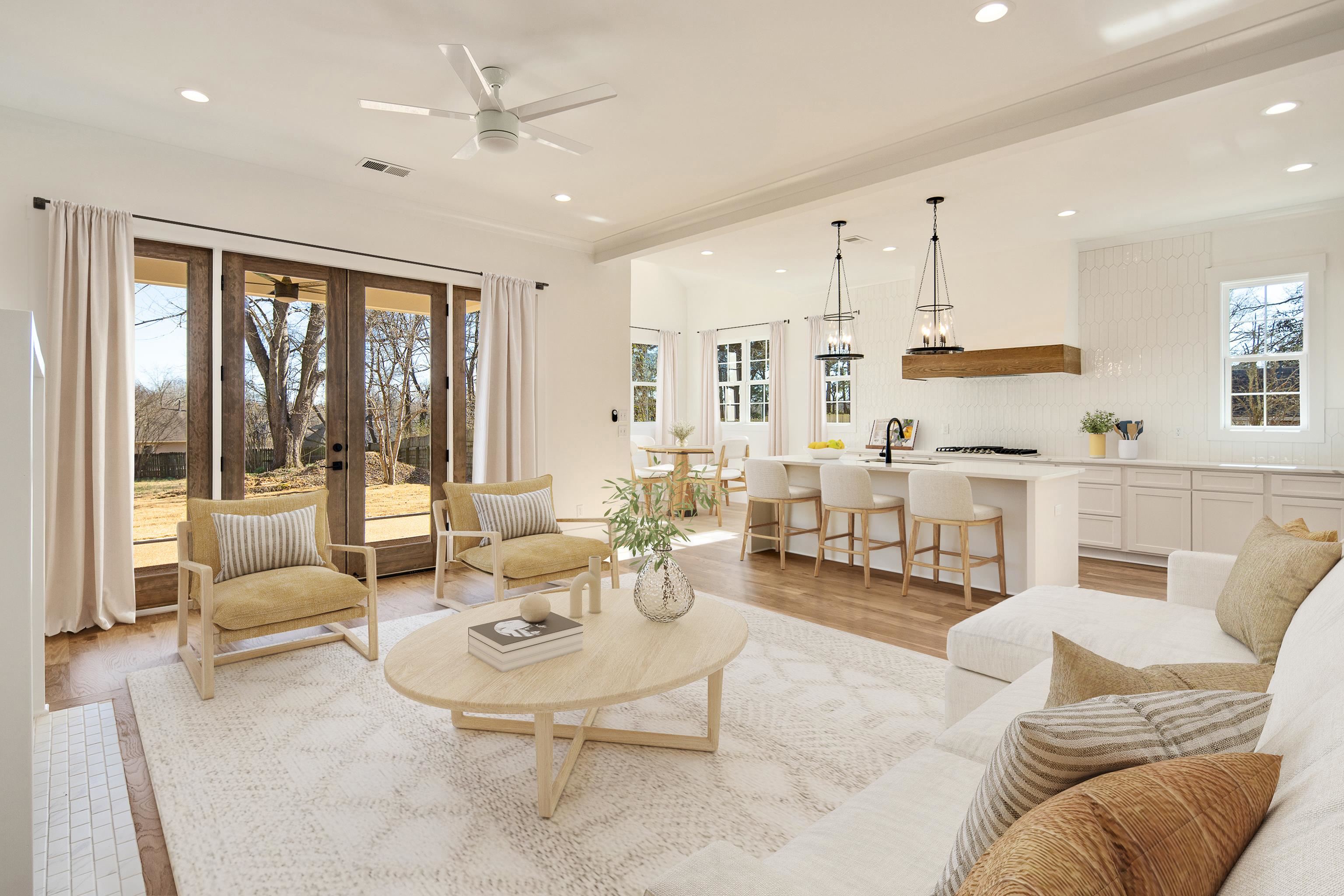 641 Fletcher Road Collierville, TN 38017 - Photo 9 of 39 a living room with furniture kitchen view and a large window