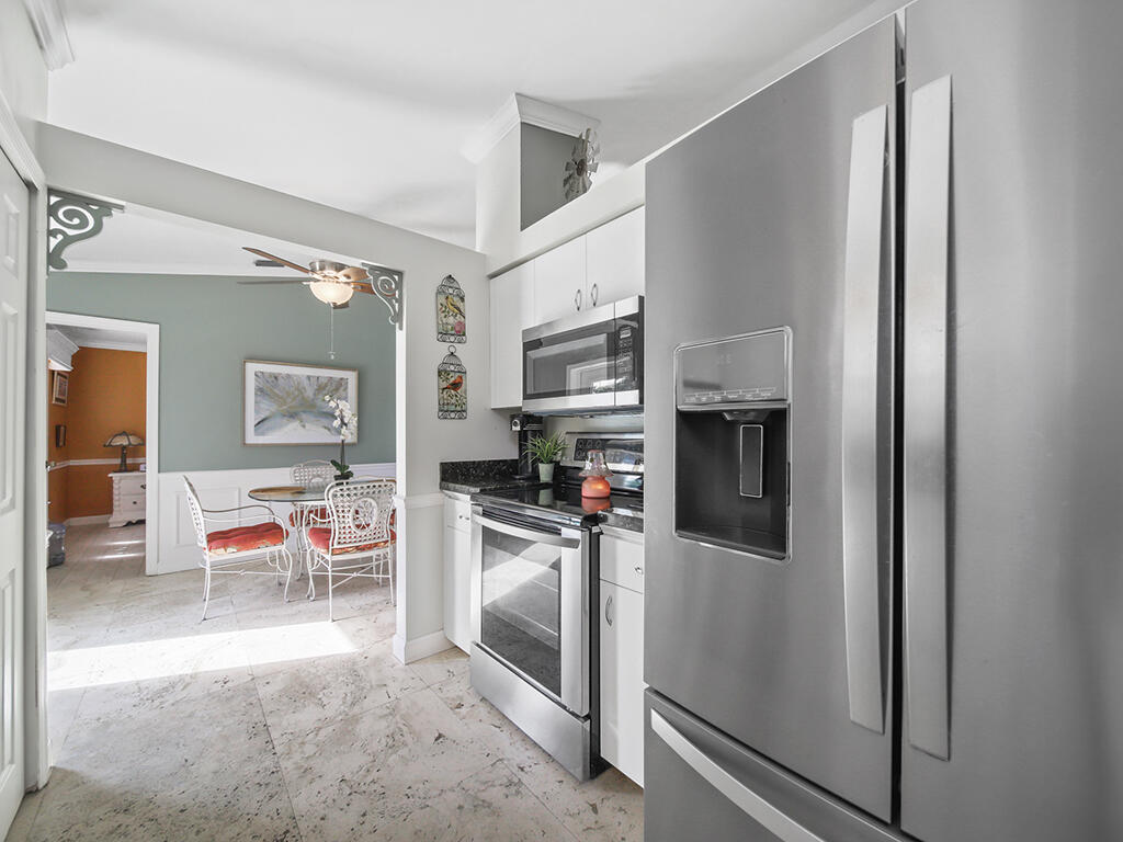 1197 Southwest Galvin Road Port St. Lucie, FL 34953 - Photo 25 of 33 Kitchen Dining