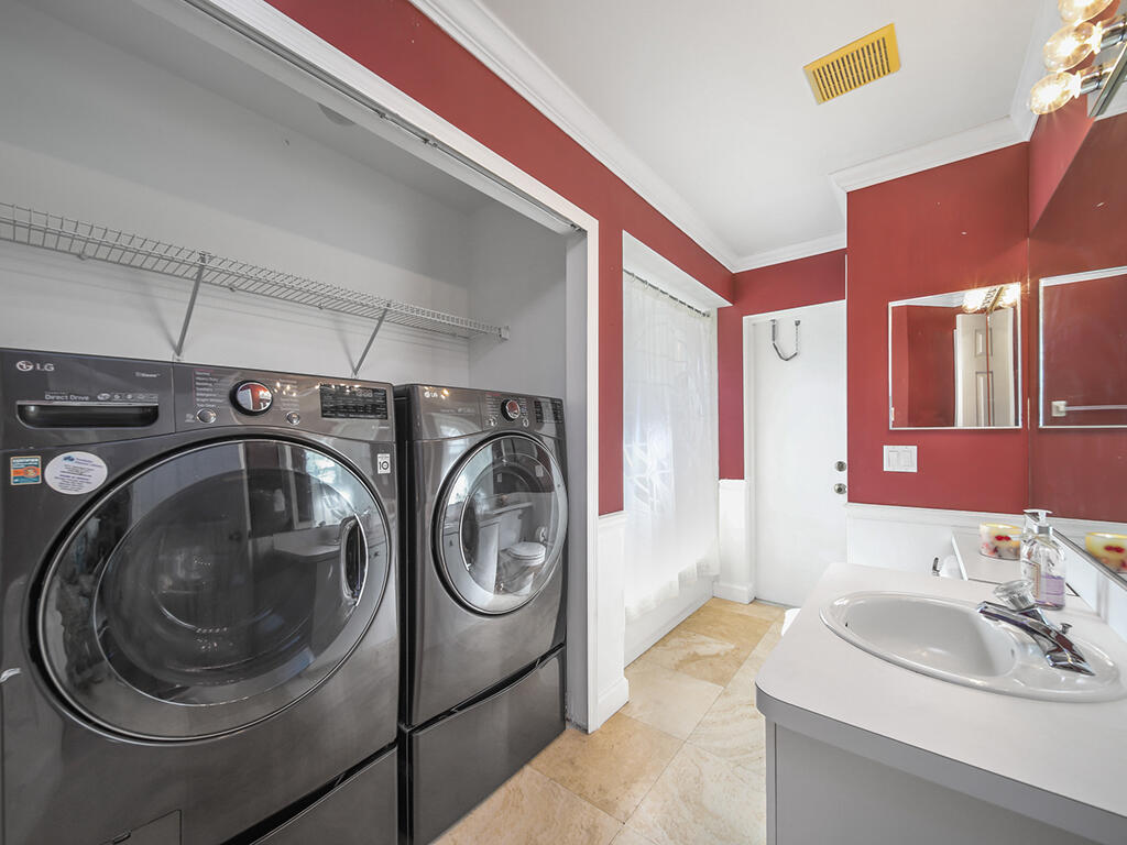 1197 Southwest Galvin Road Port St. Lucie, FL 34953 - Photo 31 of 33 Cabana Bath Laundry