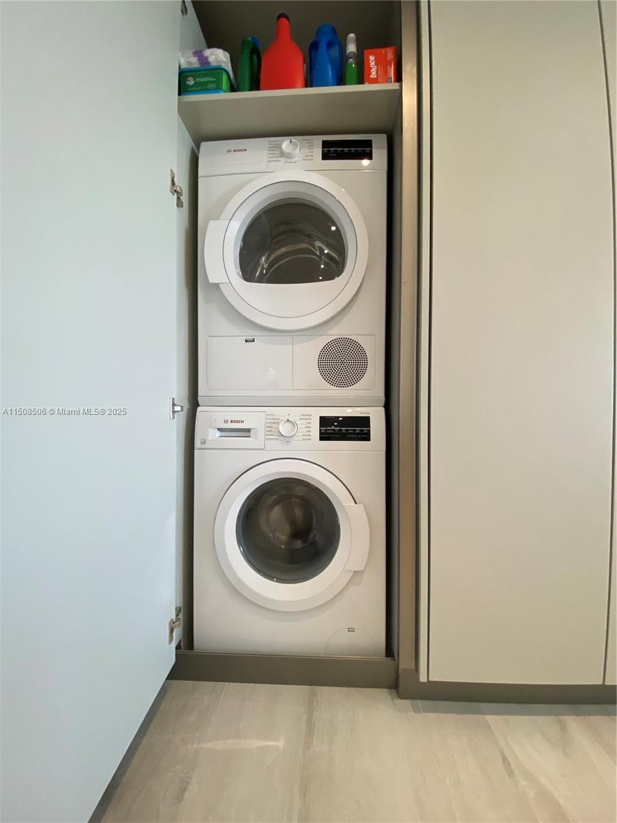 199 Ocean Ln Drive, Unit 1112 Key Biscayne, FL 33149 - Photo 26 of 36 a utility room with dryer and washer
