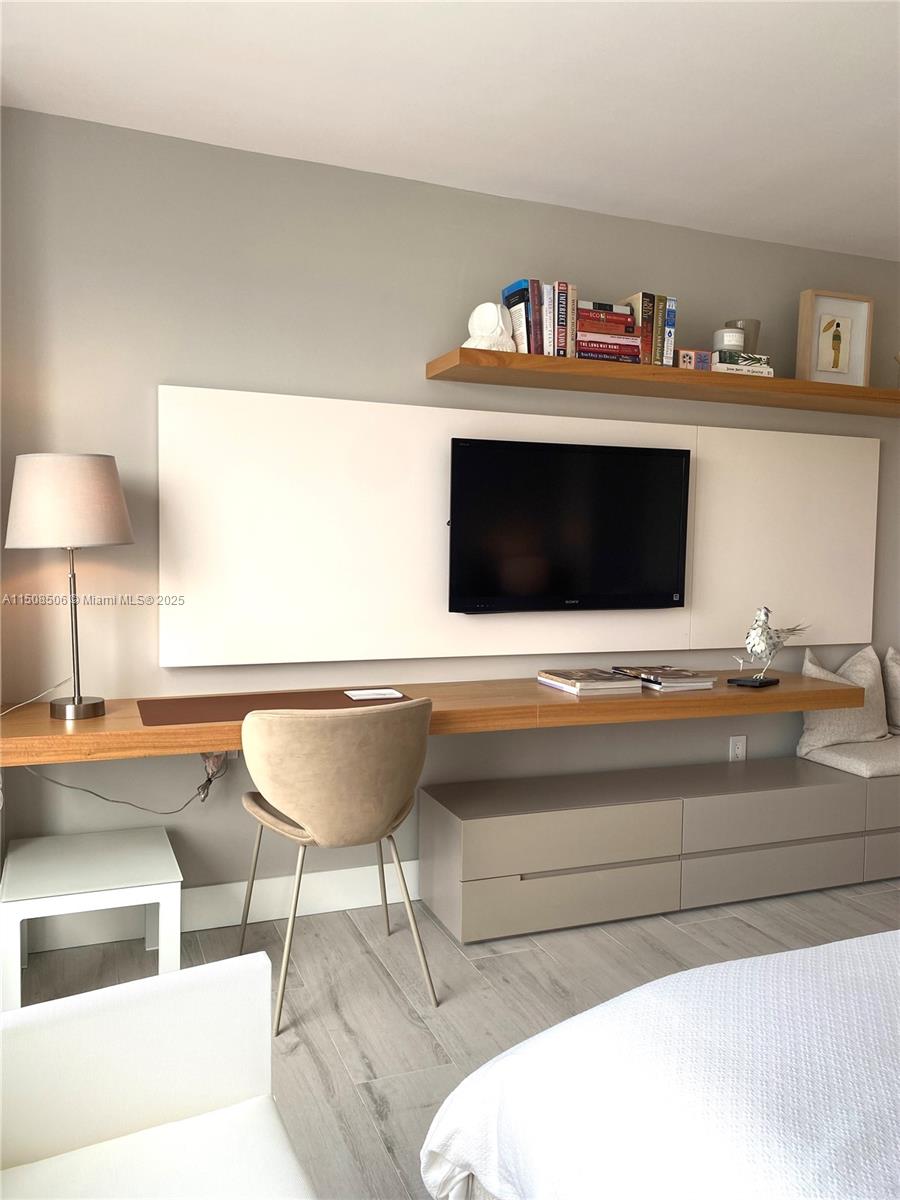 199 Ocean Ln Drive, Unit 1112 Key Biscayne, FL 33149 - Photo 34 of 36 a living room with furniture and a fireplace