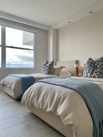 a view of a golf course with a lake