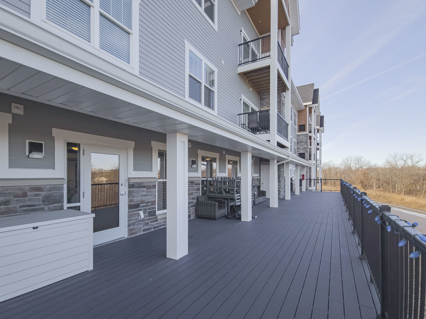 2592 Middle Road, Unit 313 Bettendorf, IA 52722 - Photo 44 of 52 an roof deck with table and chairs