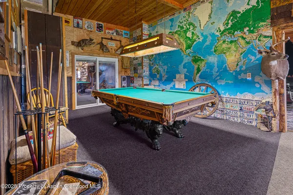 a bathroom with a double vanity sink a mirror and a bathtub