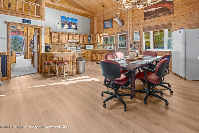 a bedroom with a bed and a table