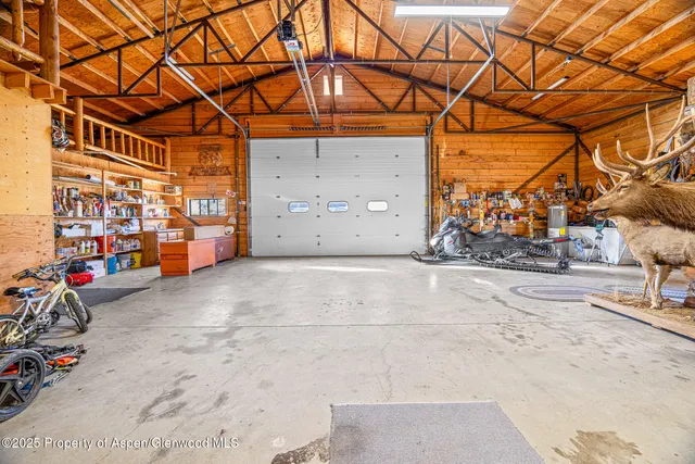 a living room with large windows