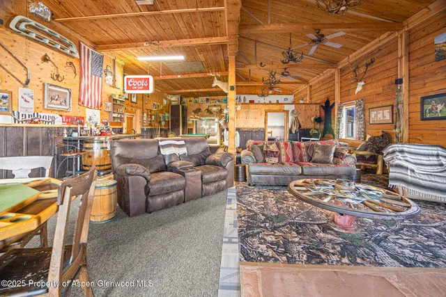 a view of a chairs and table in the patio