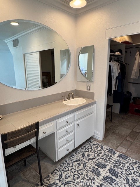71942 Eleanora Lane Rancho Mirage, CA 92270 - Photo 18 of 31 a spacious bathroom with a double vanity sink and a mirror