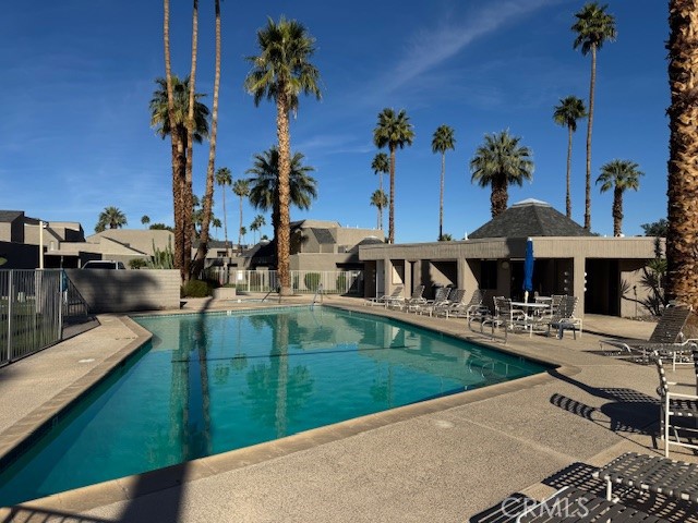 71942 Eleanora Lane Rancho Mirage, CA 92270 - Photo 26 of 31 swimming pool view with a garden space