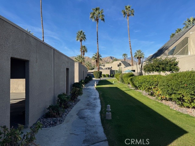 71942 Eleanora Lane Rancho Mirage, CA 92270 - Photo 29 of 31 a view of a house with a backyard
