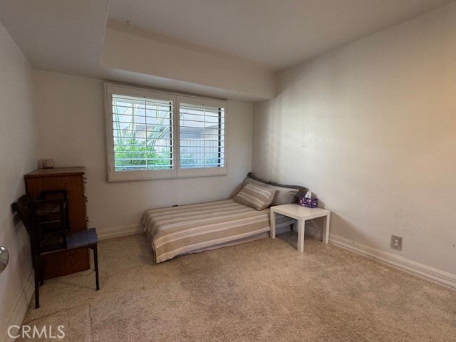 71942 Eleanora Lane Rancho Mirage, CA 92270 - Photo 10 of 31 a bedroom with a bed and a chair