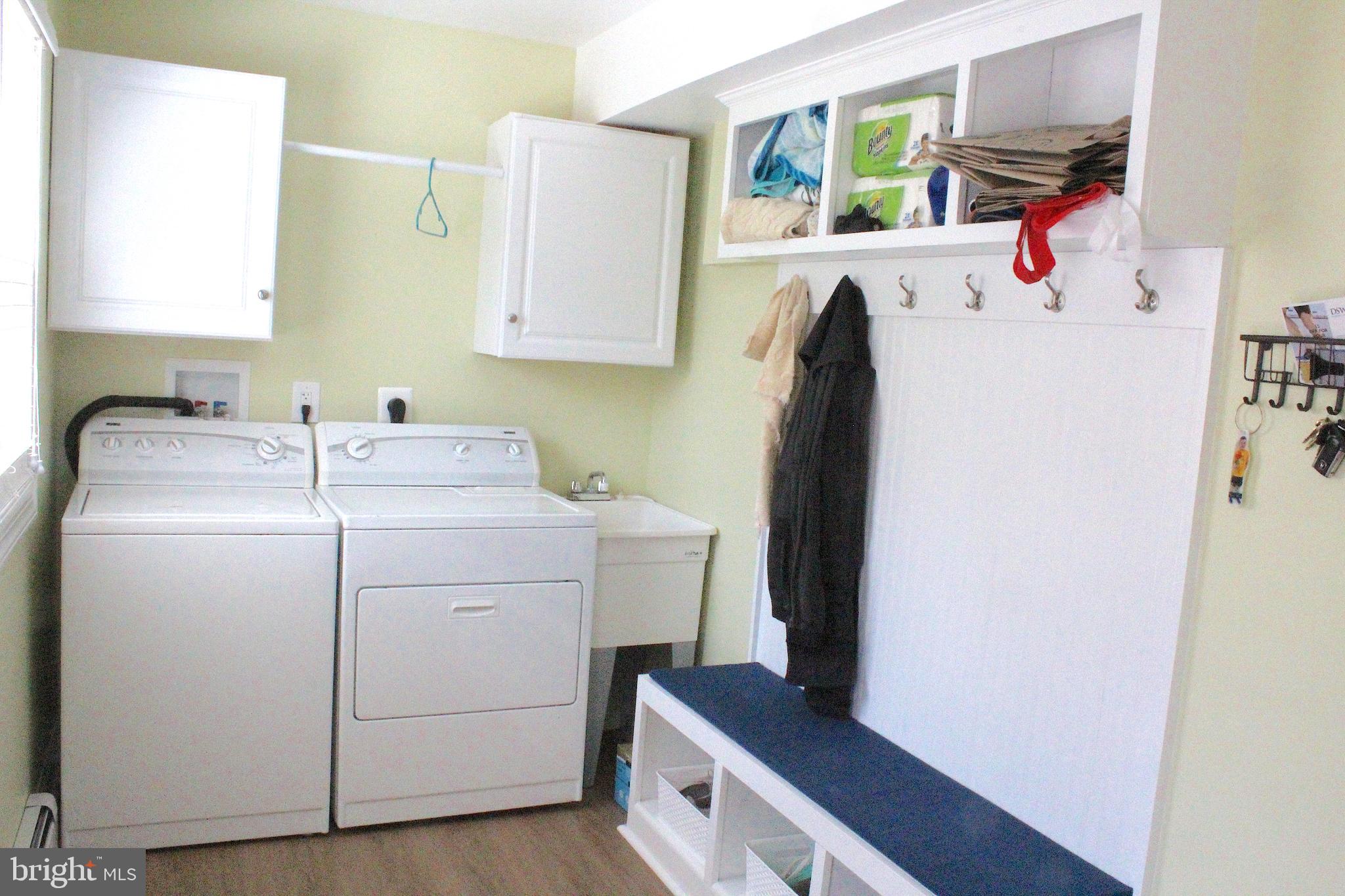 313 Madison Road Springfield, PA 19064 - Photo 16 of 32 Mud room and Laundry area with exit to paver patio