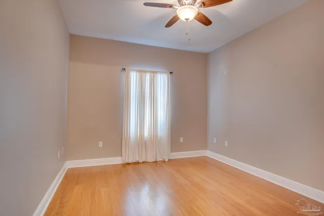 an empty room with a empty space and a window