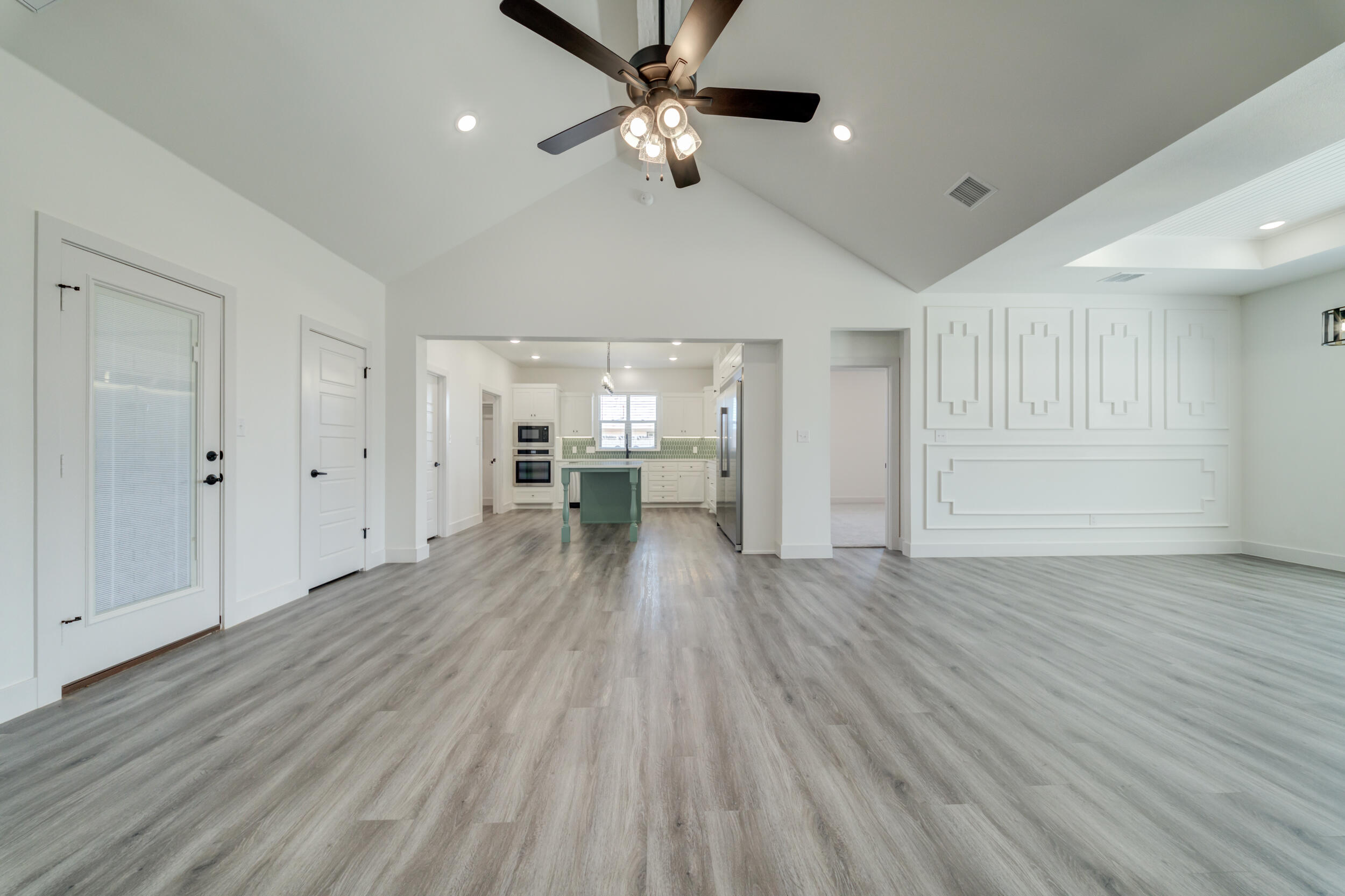 7522 56th Street Lubbock, TX 79407 - Photo 11 of 47 a view of empty room with wooden floor