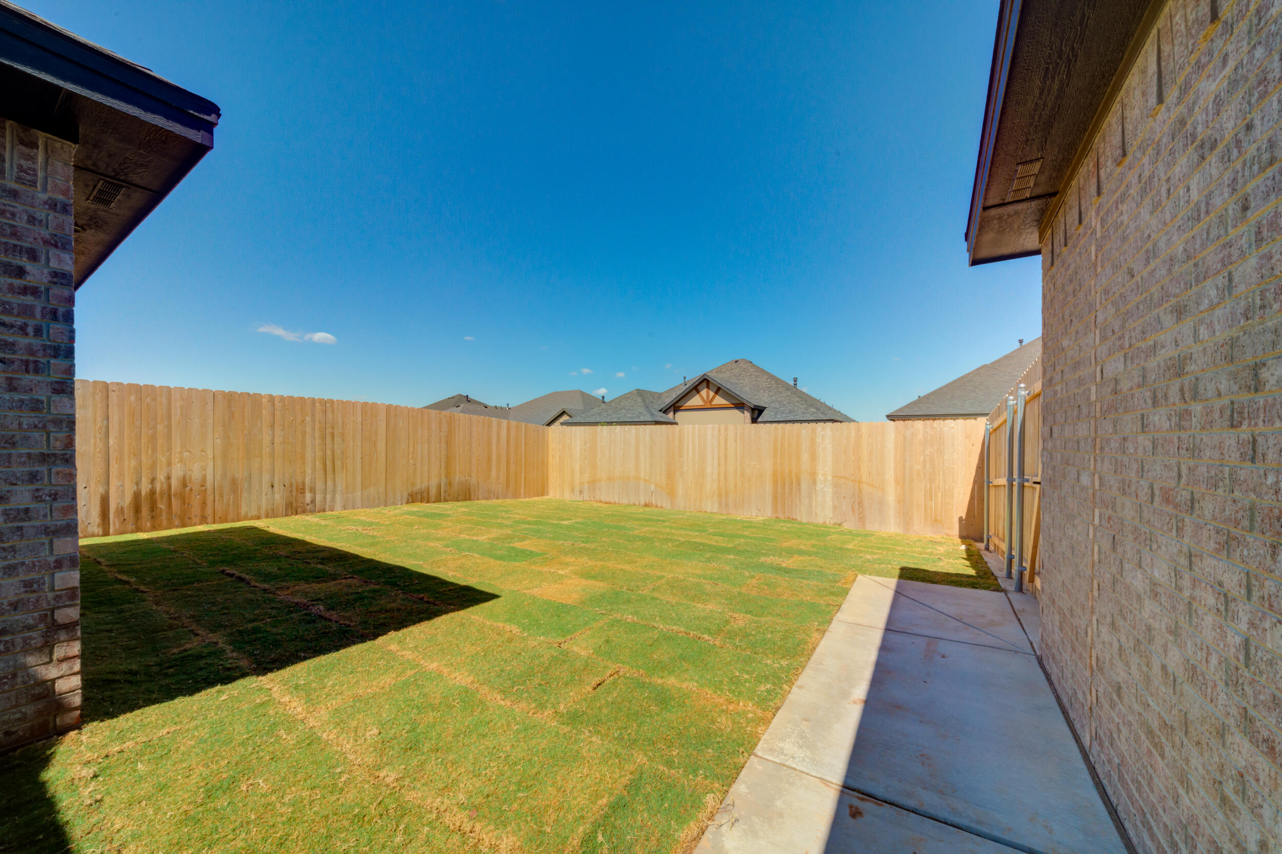 7522 56th Street Lubbock, TX 79407 - Photo 46 of 47 a view of a swimming pool with an outdoor space