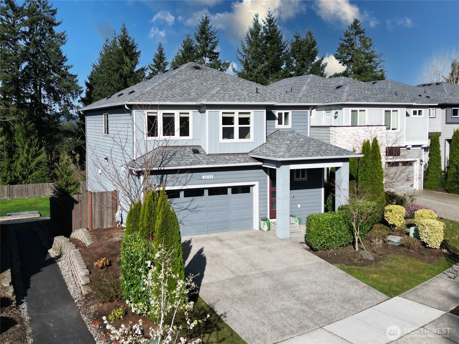 22724 41st Drive Southeast Bothell, WA 98021 - Photo 3 of 40 a front view of a house with garden