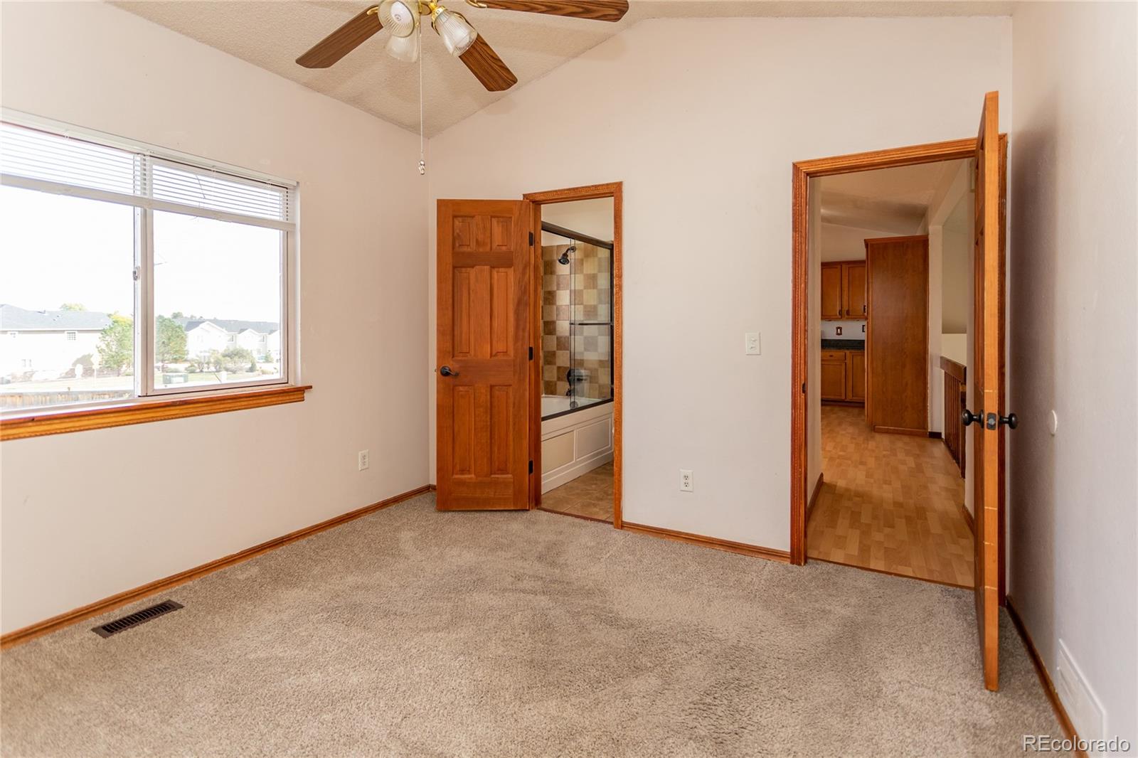 650 Howe Circle Castle Rock, CO 80104 - Photo 17 of 45 an empty room with windows and closet