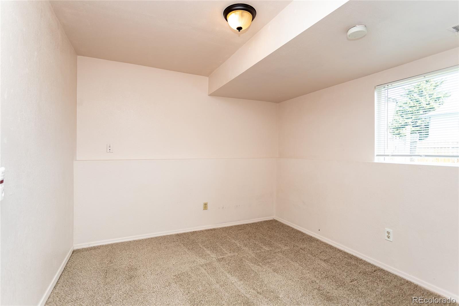 650 Howe Circle Castle Rock, CO 80104 - Photo 26 of 45 an empty room with a window