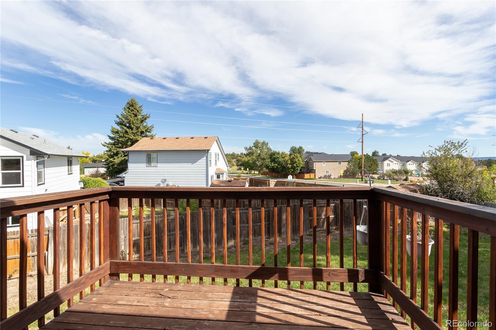 650 Howe Circle Castle Rock, CO 80104 - Photo 32 of 45 a view of a wooden street from a balcony