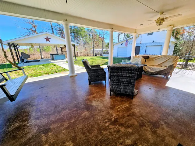 a view of a living room with furniture