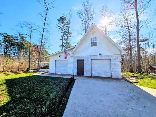 a view of a backyard with garden