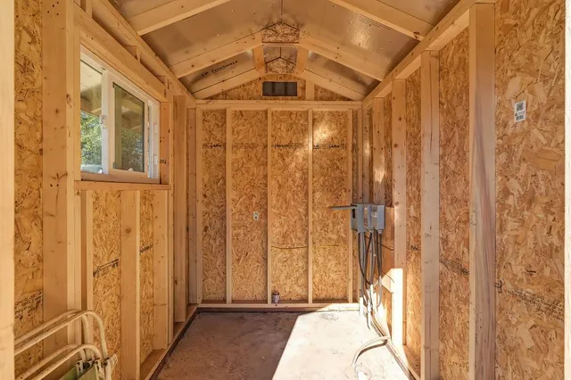 a bathroom with a shower and a tub