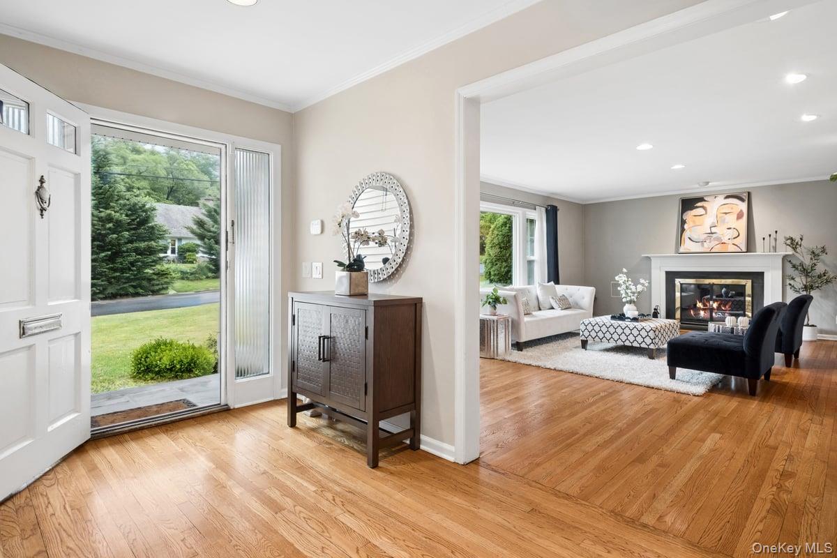 30 Stonehouse Road Scarsdale, NY 10583 - Photo 2 of 24 Welcoming entry hall to 30 Stonehouse Rd, with beautiful hardwood floors throughout.